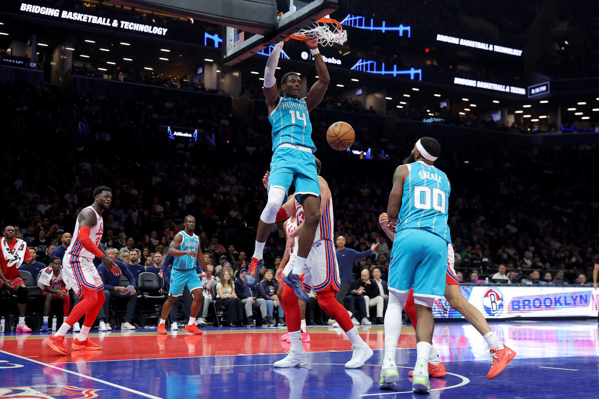 Charlotte’s Moussa Diabate (14) throws down one of his six dunks Wednesday against the Brooklyn Nets.