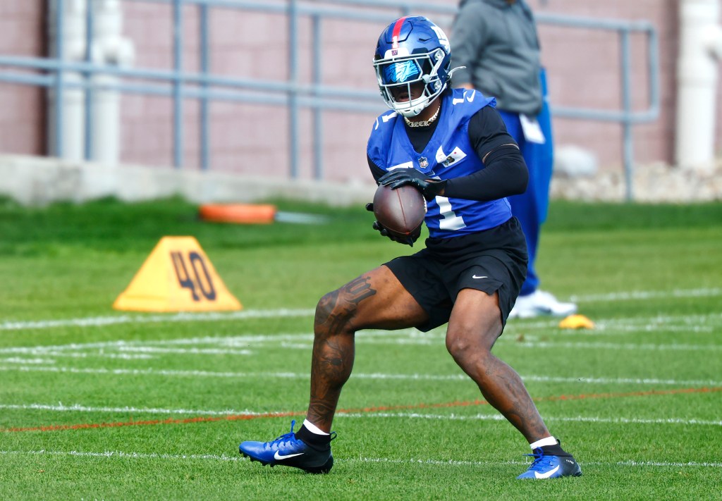 New York Giants wide receiver Malik Nabers participates in football practice.