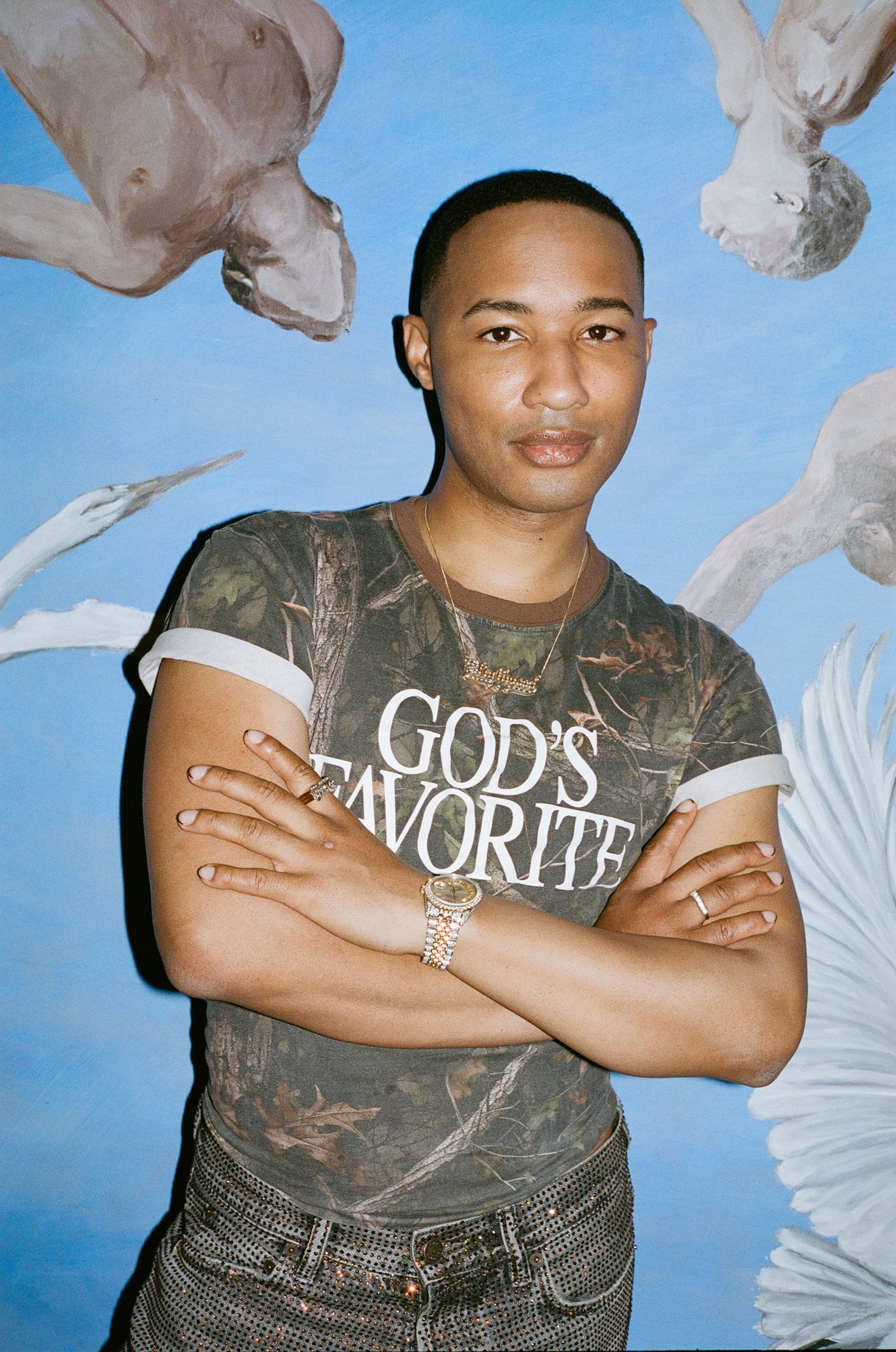 Image may contain JWess Art Blakey Clothing TShirt Face Head Person Photography Portrait and Accessories