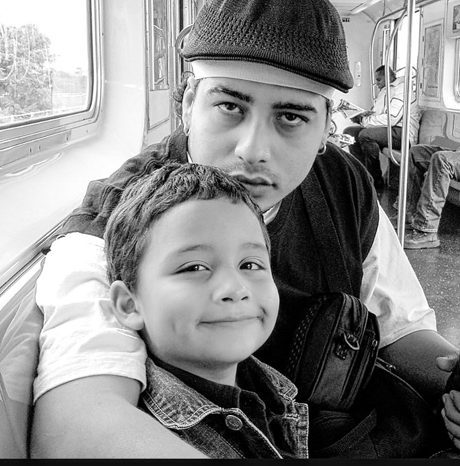 Although born in New York City, Diaz, pictured above with his son in 2001, spent most of his life as a child and young adult moving between the Bronx and Puerto Rico.