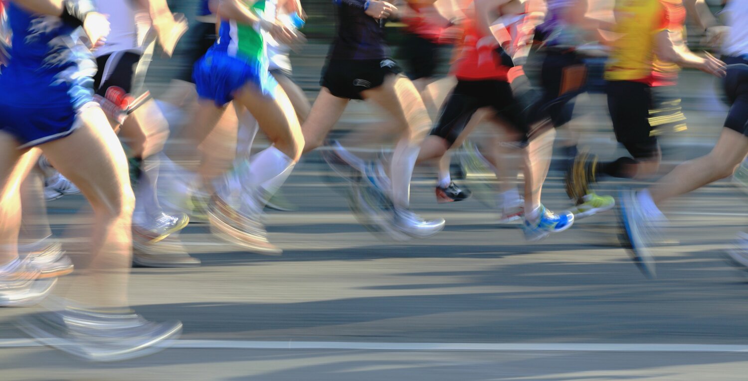 Runners in movement