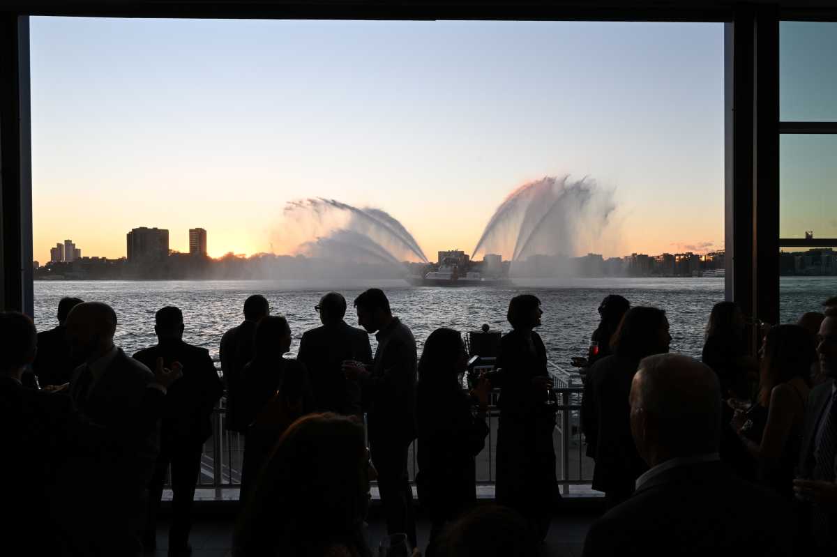 Guests watch the FDNY Marine Division Fireboat during the Hudson River Park Friends 2026 Gala at Pier Sixty at Chelsea Piers on Oct. 8, 2026 in New York City. 