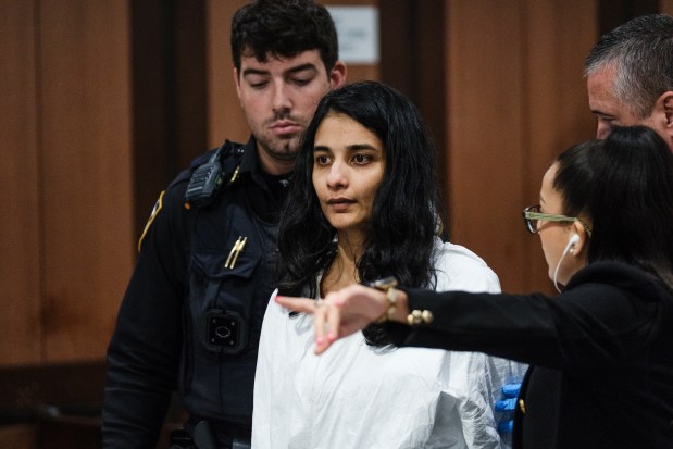 Francis Cabello is pictured during her arraignment in Queens Criminal Court on Friday, Oct. 16, 2026. Cabello is accused of killing her daughter, Fabiana Cabello, in their 110th St. home near 95th Ave. in Richmond Hill. (Stephen Yang / Pool)