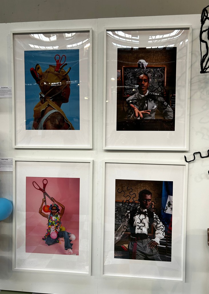 A series of photographs highlighting creative hairstyling and cultural expression featured in Haitian-American artist Kayra Theodore’s “The Art & Rituals of Hair” exhibition at CultureCon 2026 at the Brooklyn Navy Yard. Photo by Catherine Roth / The Haitian Times
