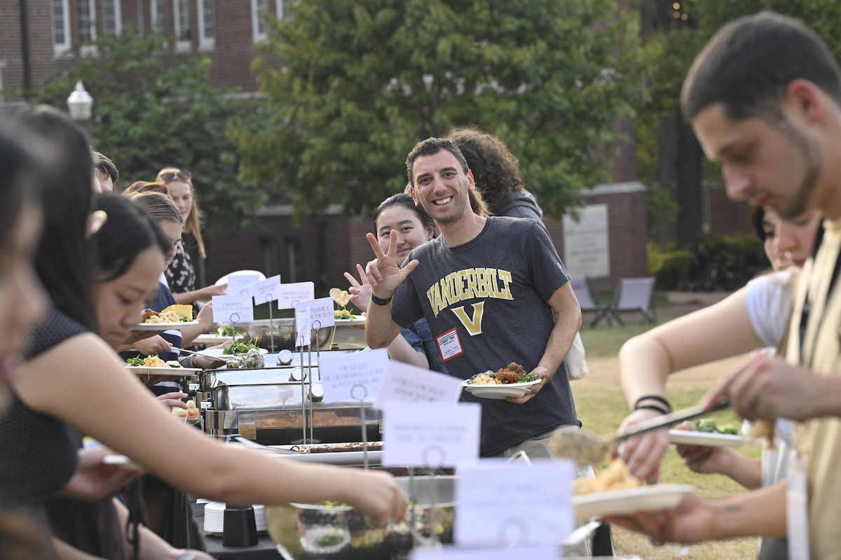 Students, faculty and staff enjoy traditionally Southern comfort food at the inaugural The Longest Table event on Alumni Lawn Oct. 1. (Vanderbilt University)