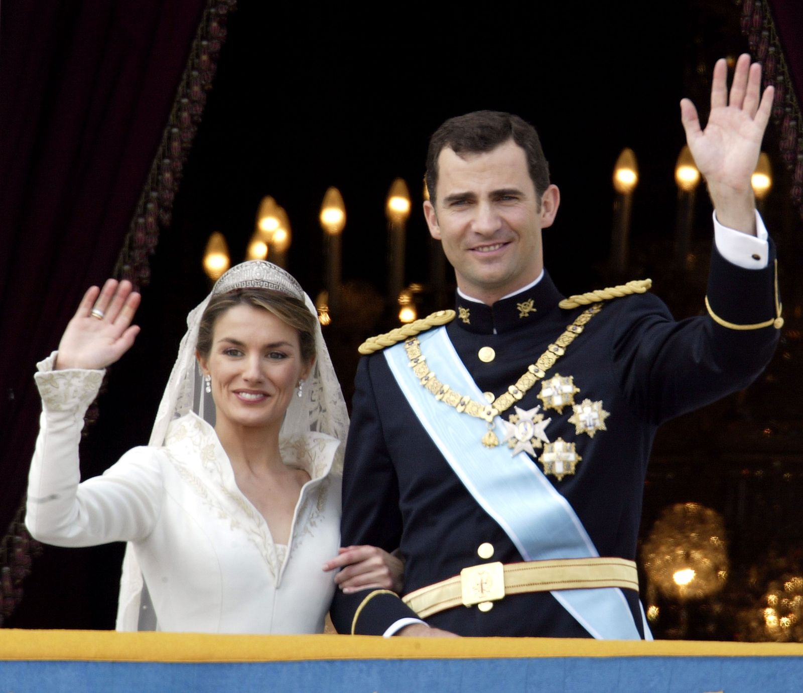 MADRID SPAIN MAY 22 Spanish Crown Prince Felipe de Bourbon and his bride Letizia wave as the Royal couple appears on...