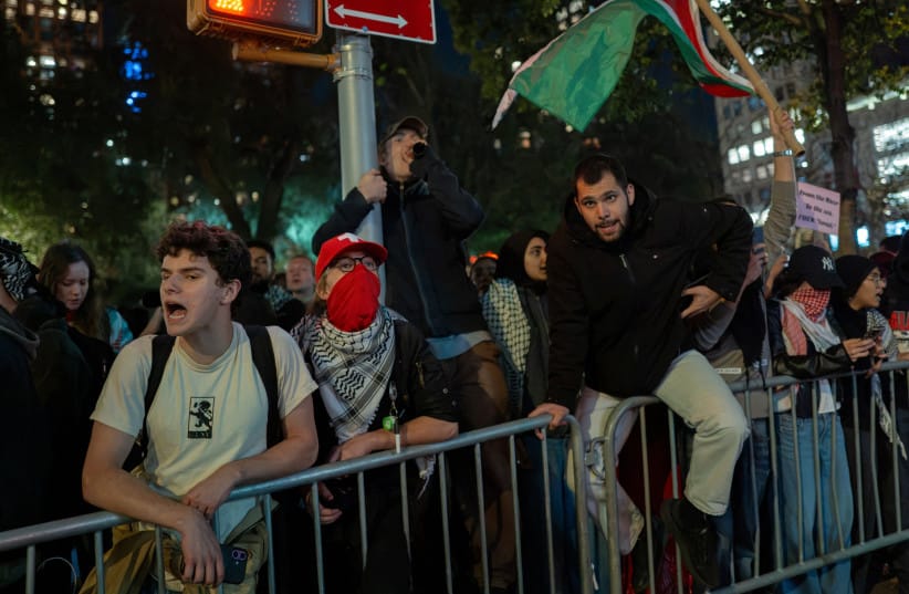 Protestors shout at New York City Mayor Zohran Mamdani after he attends a vigil by a pro-peace Israeli group as pro-Palestinian protestors rally in New York City, US, October 7, 2026.