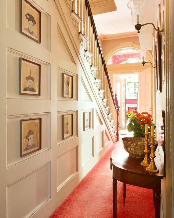 Nineteenth-century Chinese portraits hang in the front hall.