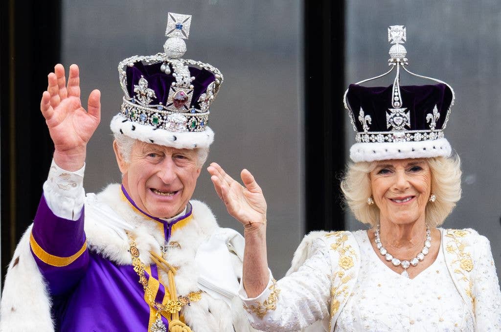 King Charles III and Queen Camilla appear on the balcony of Buckingham Palace following the Coronation of King Charles III and Queen Camilla 