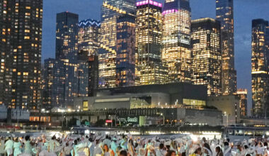 Thousands of diners dressed in white gathered at New York City’s Pier 84 for Dîner en Blanc, an annual outdoor event where guests bring their own tables, chairs, food and decorations. The location is kept secret until shortly before the event.