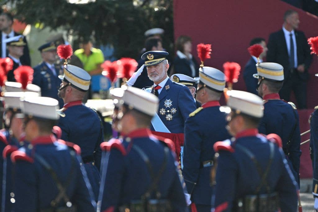 Spain's King Felipe VI reviews the troops during Spain's National Day military parade in Madrid
