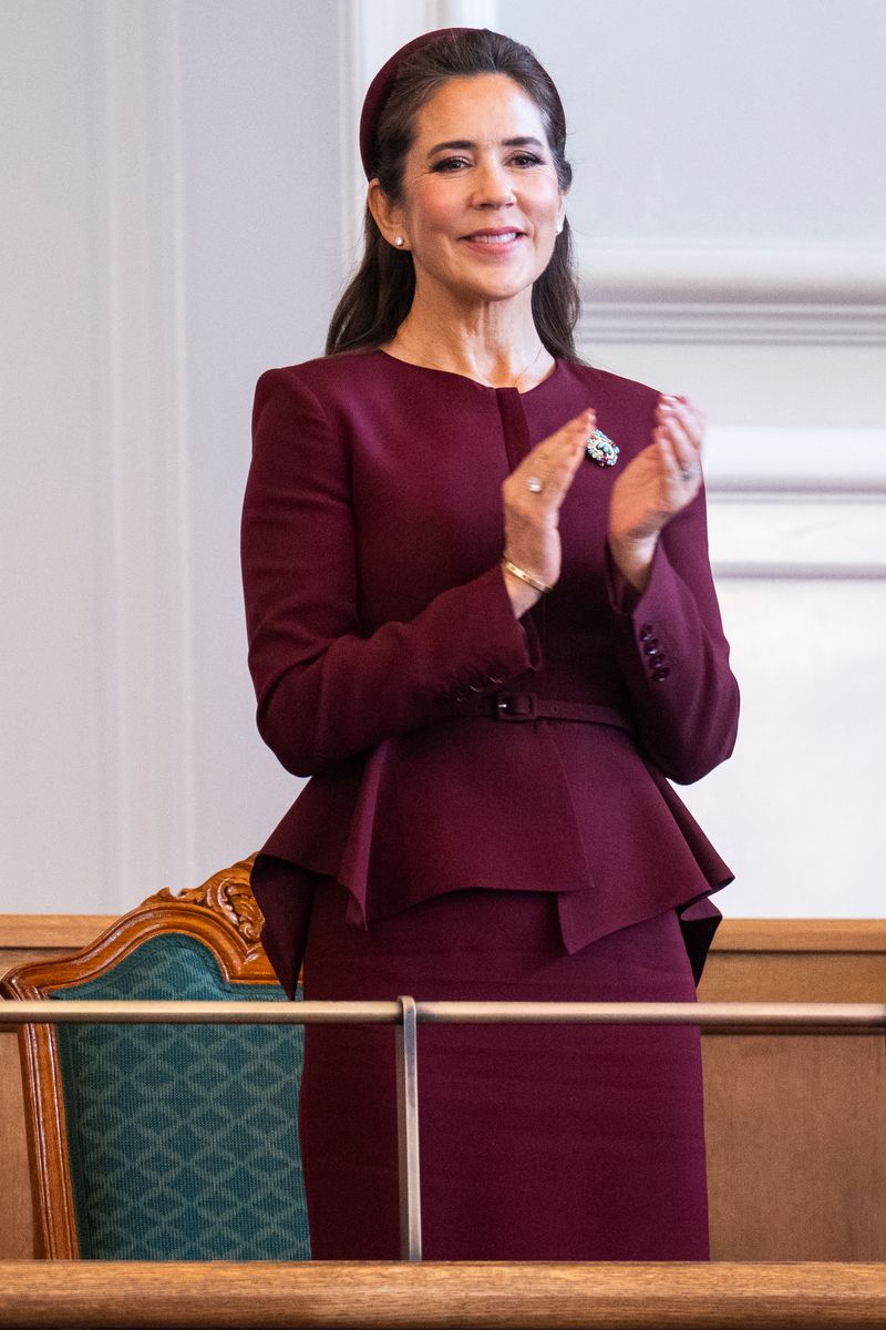 A sculpted peplum jacket and matching pencil skirt gave the queen’s monochromatic ensemble an elegant silhouette.
