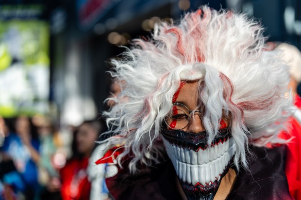 A person dressed as Okarun of DanDaDan attends Comic Con at the Jacob K. Javits Convention Center on Friday, Oct. 9, 2026, in New York. (AP Photo/David 'Dee' Delgado)