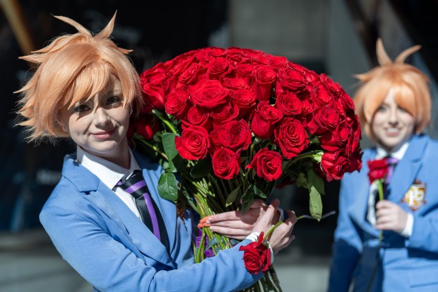 Hayley as Hikaru, left, and Paige as Kaoru, right, cosplay as characters from the Outran high school Host Club manga and anime series at Comic Con at the Jacob K. Javits Convention Center on Friday, Oct. 9, 2026, in New York. (AP Photo/David 'Dee' Delgado)