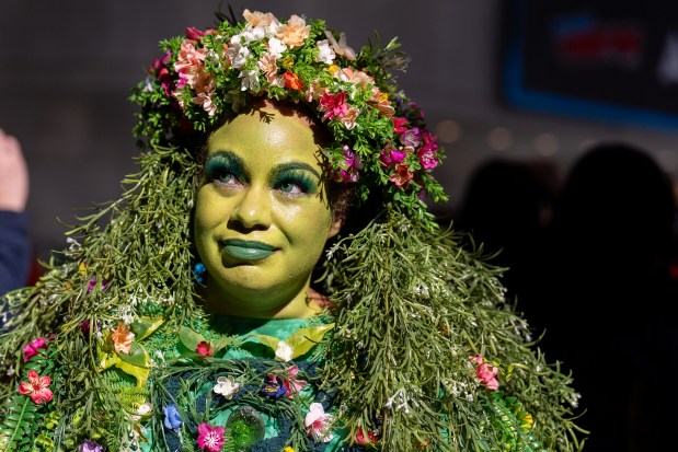 Veronica Bourque cosplays as Tefiti from the movie Moana at Comic Con at the Jacob K. Javits Convention Center on Friday, Oct. 9, 2026, in New York. (AP Photo/David 'Dee' Delgado)