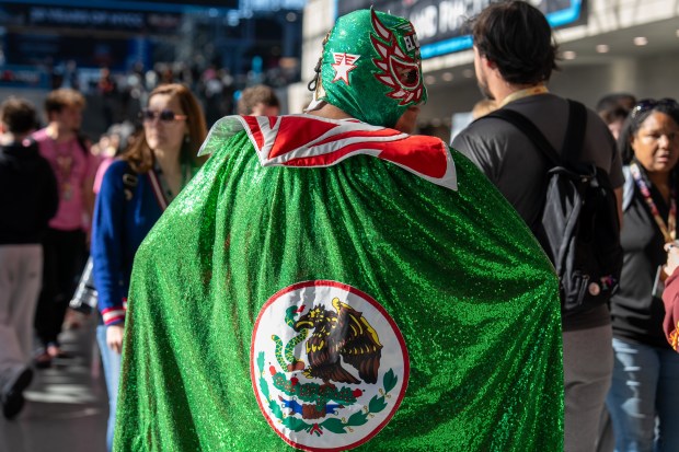 Cesar Salazar cosplays as El Grande Americano attends Comic Con at the Jacob K. Javits Convention Center on Friday, Oct. 9, 2026, in New York. (AP Photo/David 'Dee' Delgado)