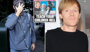 Hamas-loving NYC teacher cowardly covers his face as he returns to school