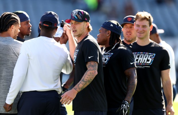 Bears quarterback Tyson Bagent, center, prepares with his teammates for a game against the Jets on Sunday, Oct. 4, 2026, at Soldier Field. (Chris Sweda/Chicago Tribune)