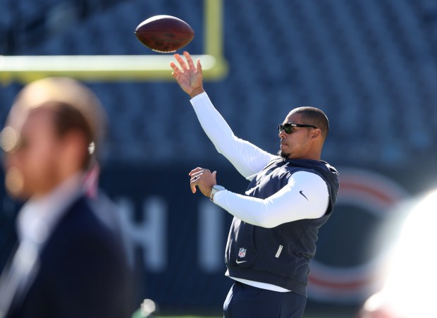 Chicago Bears General Manager Ryan Poles throws a football on the field before a game between the Bears and the New York Jets at Soldier Field in Chicago on Oct. 4, 2026. (Chris Sweda/Chicago Tribune)