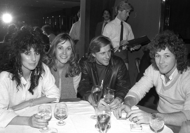 An interesting quartet is seen at George Martin's sports hangout on Jan. 26, 1981. Sampling the white wine were Cher, Kate Jackson, tennis star Borg Bjorn and New York Rangers scoring ace Ron Duguay. They were all in the 100G pro-am tennis tournament at Caesar's Palace in April. The guys showed the gals what real sports they are. They picked up the tab. (Charles Ruppmann / New York Daily News)