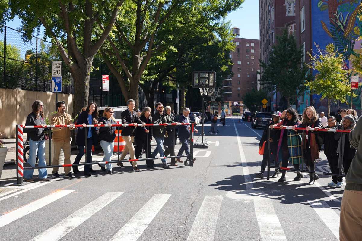 New swing gates cordoning off the Clarkson Street School Street outside of the City As School and P.S. M721 in Hudson Square.