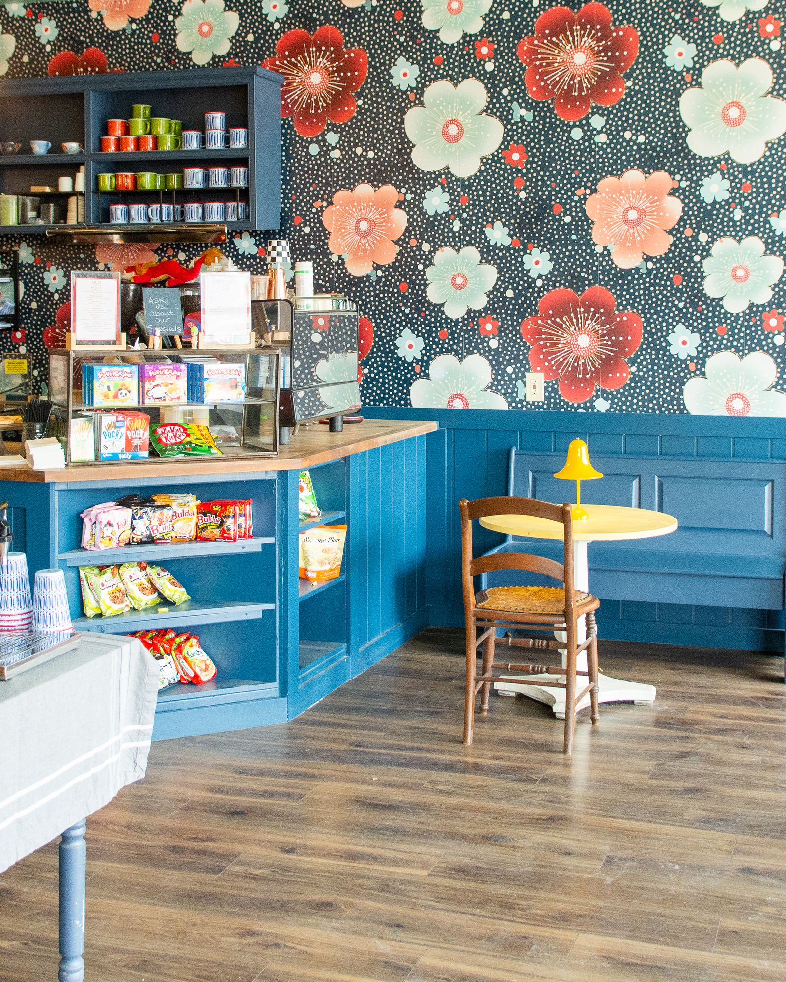 Image may contain Indoors Interior Design Shop Floor Chair Furniture Restaurant and Grocery Store