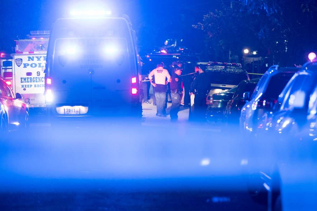 Apparent Queens home invasion leaves knife-wielding woman shot by cops, three people stabbed by suspect