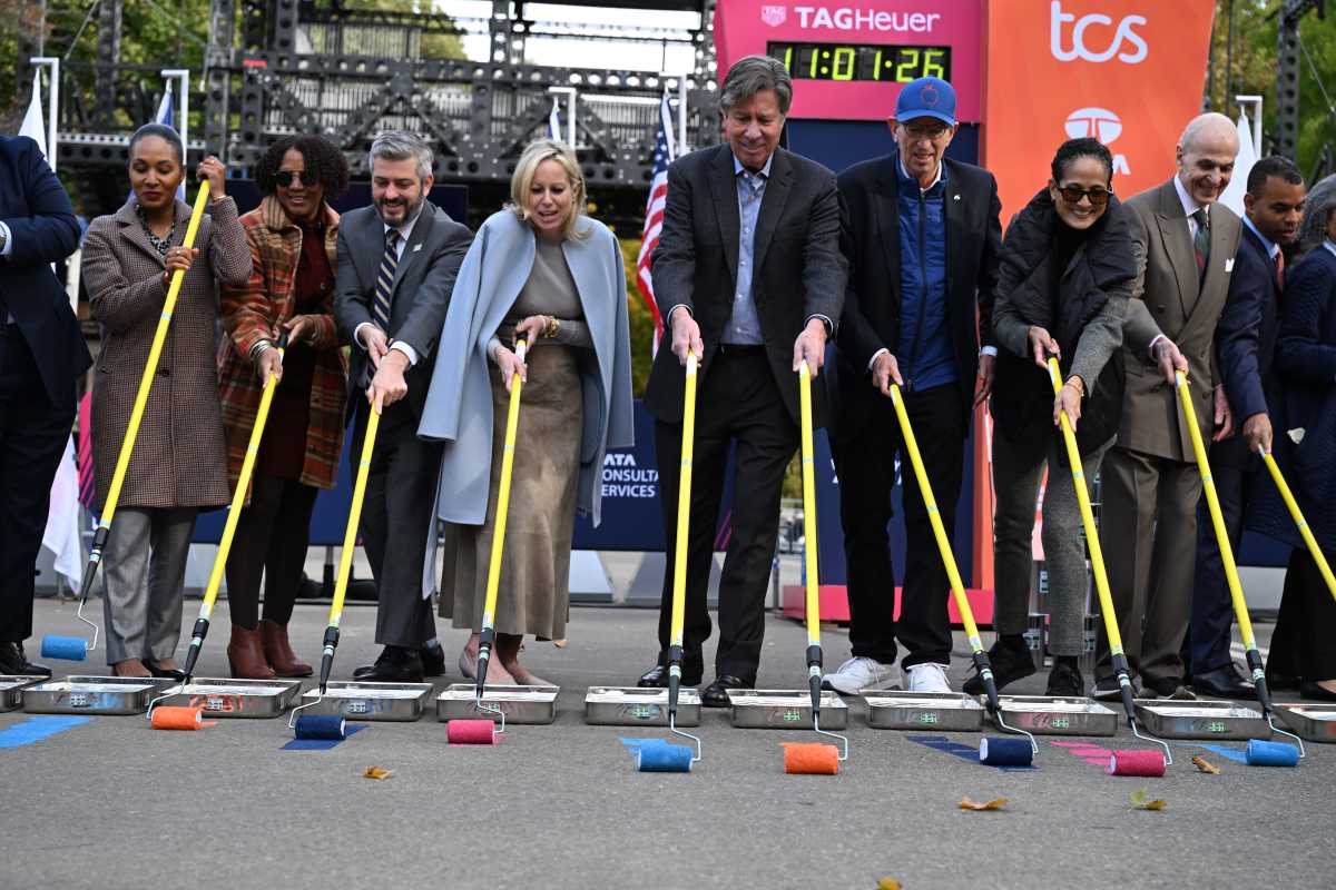 The TCS New York City Marathon marked its 50th anniversary with the ceremonial blue-line painting.