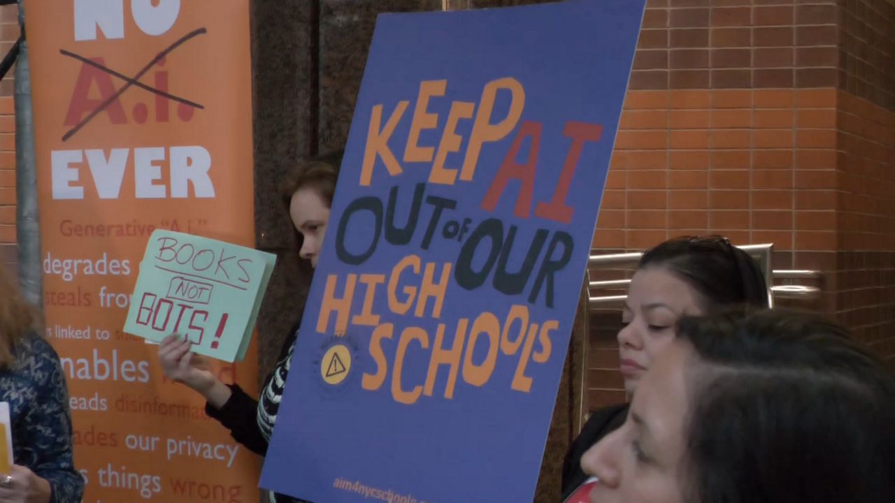 Protesters want the Mamdani administration to extend the moratorium on AI to high schools and cancel the AI pilot program expected to roll out in November. (Spectrum News NY1)