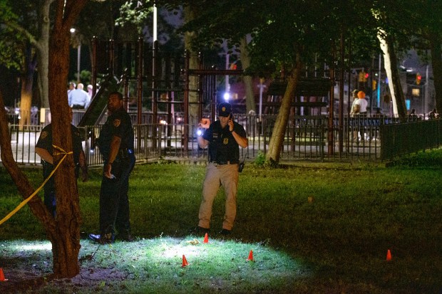 Police investigate a double-shooting in a courtyard of the NYCHA Pink Houses on Loring Avenue in Brooklyn, New York on Tuesday, July 7, 2020. Shatavia Walls was shot in the courtyard and died of her wounds on Friday, July 17, 2020. (Gardiner Anderson for New York Daily News)
