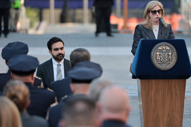 NEW YORK, NEW YORK - OCTOBER 13: Mayor Zohran Mamdani listens as New York Police Commissioner Jessica Tisch speaks during a ceremony at the NYPD Memorial Wall on October 13, 2026 in New York City. Mayor Mamdani was joined by New York Police Commissioner Jessica Tisch as added names of 42 fallen NYPD officers are unveiled at the memorial wall. The wall honors every NYPD officer who dies in the line of duty. (Photo by Michael M. Santiago/Getty Images)