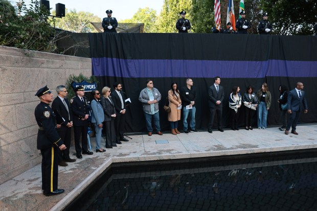 NEW YORK, NEW YORK - OCTOBER 13: New York Police Commissioner Jessica Tisch, Mayor Zohran Mamdani and family of fallen NYPD officers attend a ceremony at the NYPD Memorial Wall on October 13, 2026 in New York City. Mayor Mamdani was joined by New York Police Commissioner Jessica Tisch as added names of 42 fallen NYPD officers are unveiled at the memorial wall. The wall honors every NYPD officer who dies in the line of duty. (Photo by Michael M. Santiago/Getty Images)