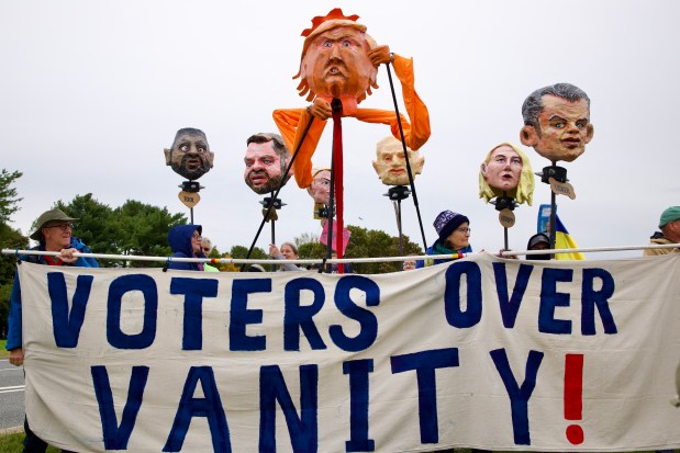 Demonstrators take part in a "No Kings: Vote Early" rally near Memorial Circle in Arlington, Virginia, on Oct. 17, 2026. (Photo by Amid FARAHI / AFP via Getty Images)