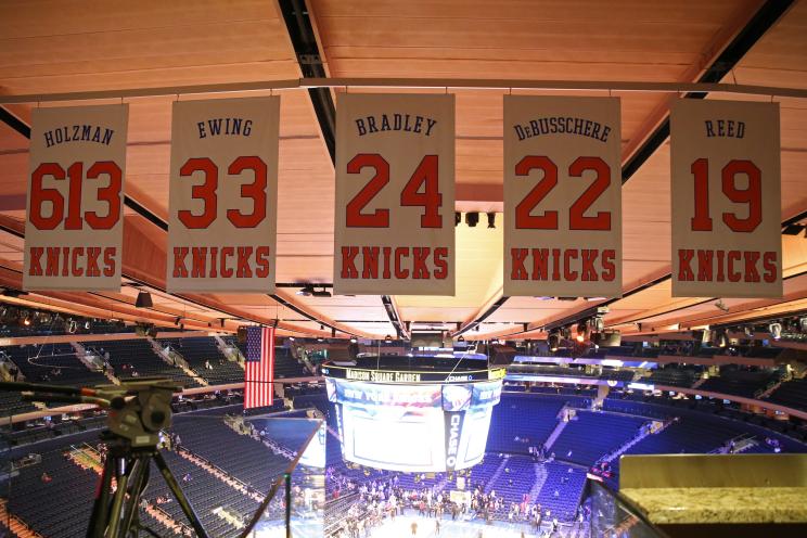 Banners in honor of Patrick Ewing #33, Bill Bradley #24, Red Holzman #613, Dave DeBrusschere #22, and Willis Reed #19 of the New York Knicks