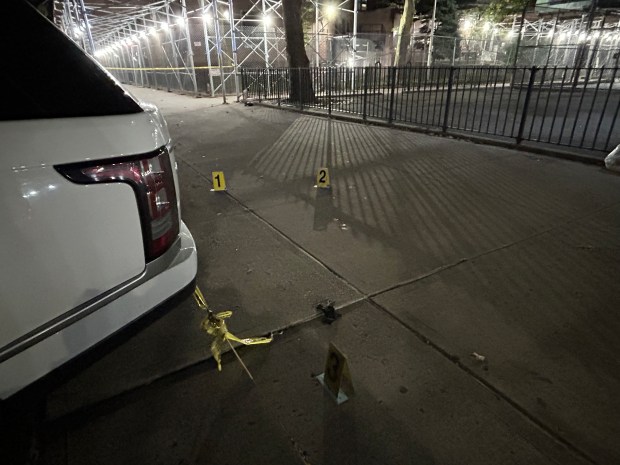 A 15-year-old boy was fatally shot and a 57-year-old man sitting in a plastic chair was wounded in a shooting on W. 115th St. near Malcolm X Blvd. inside NYCHA's Martin Luther King Jr. Towers on Wednesday, Oct. 7, 2026. (Kerry Burke / New York Daily News) 