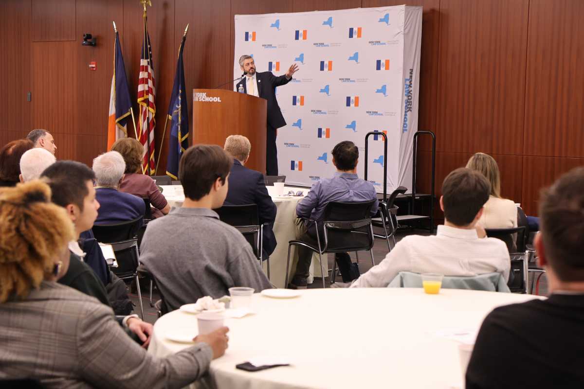 DOT Commissioner Mike Flynn speaking at the New York Law School on Oct. 8, 2026.