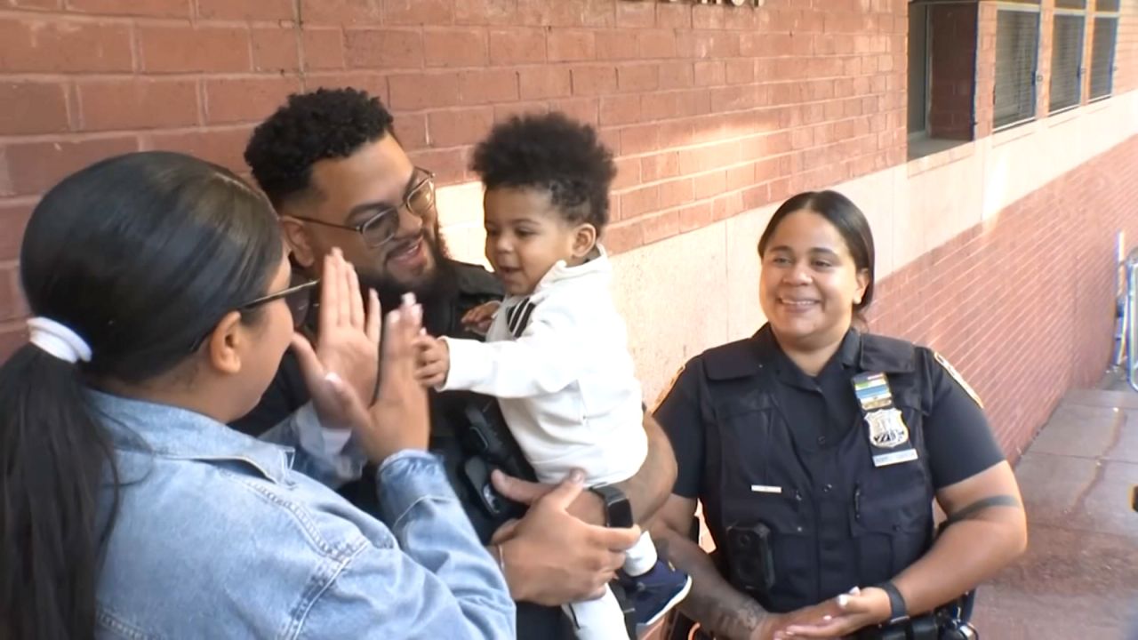 Police officers reunite with baby they saved from choking