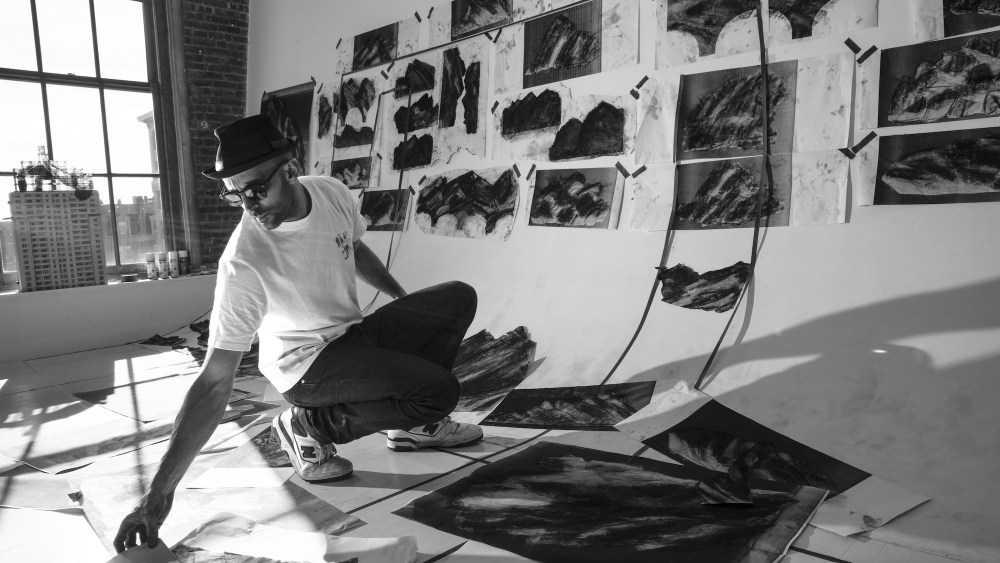 JR working in his New York studio.