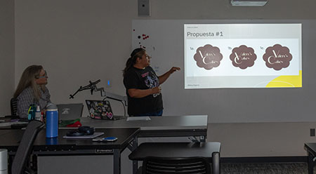 Mandy Gutierrez presenting designs