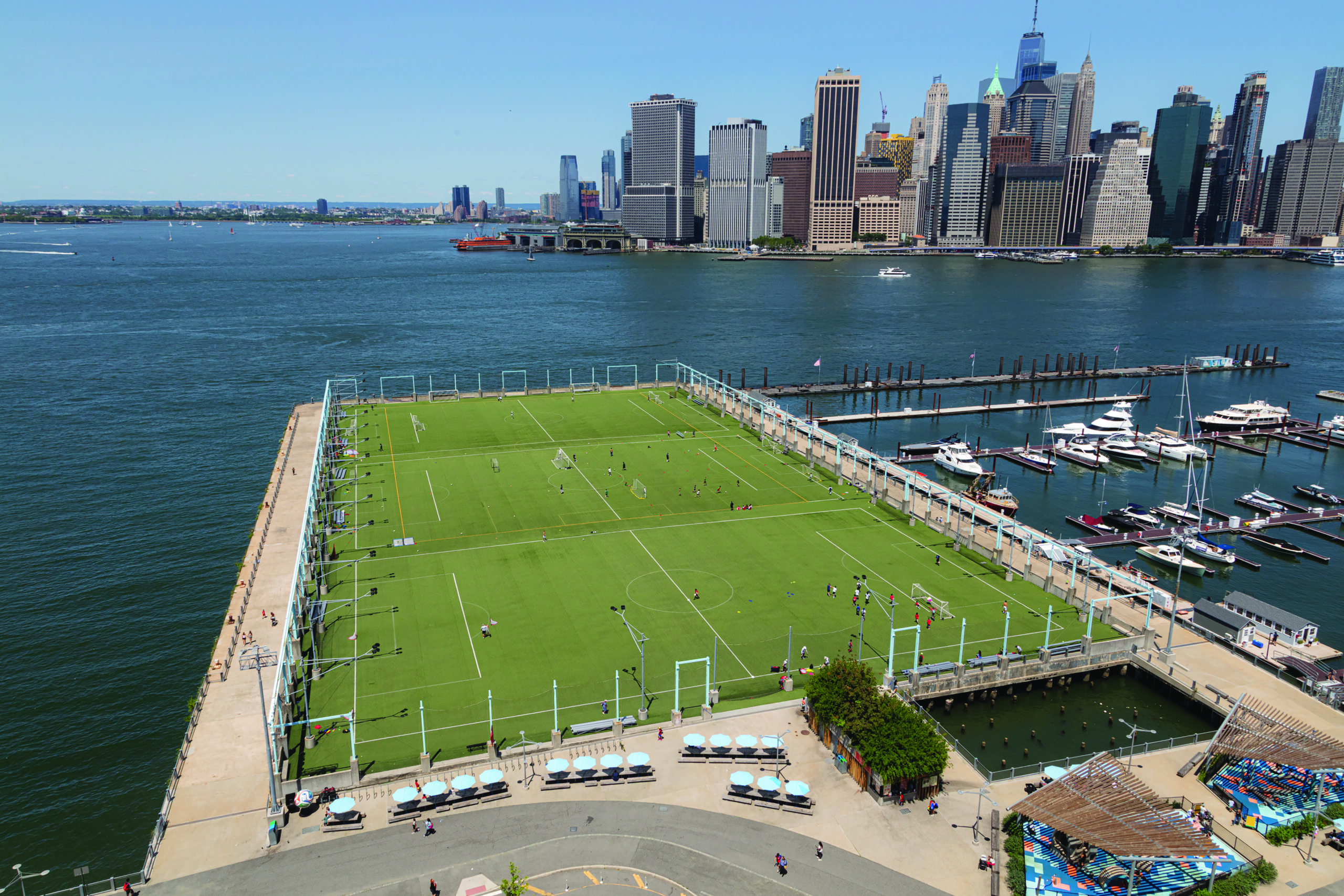 Soccer players at New York's Brooklyn Bridge park.
