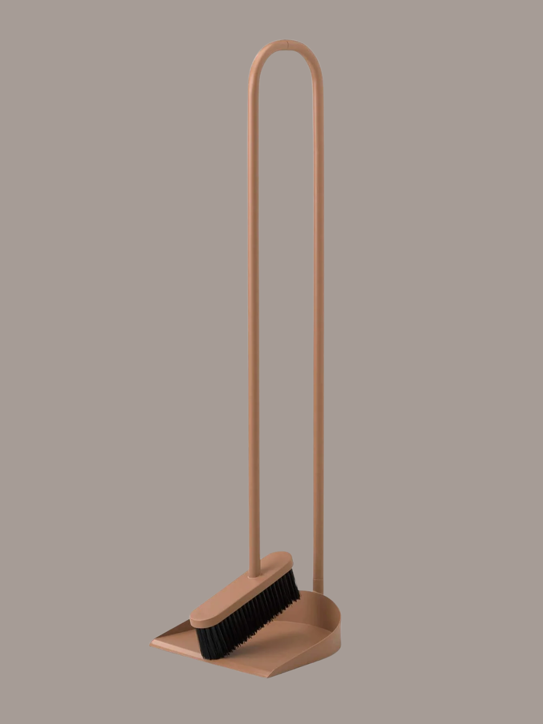 A beige broom set from Northern
