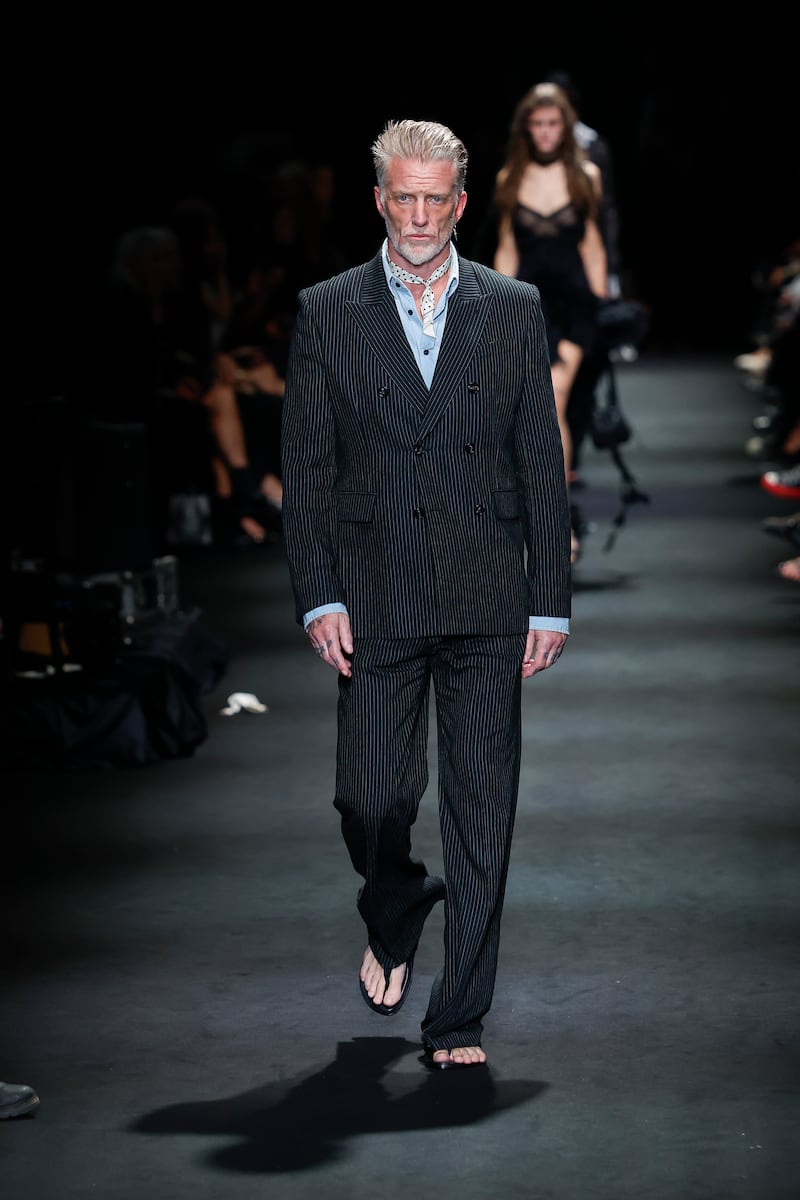 Josh Homme stuns fans in a debut runway walk as part of Paris Fashion Week on October 3, 2026.