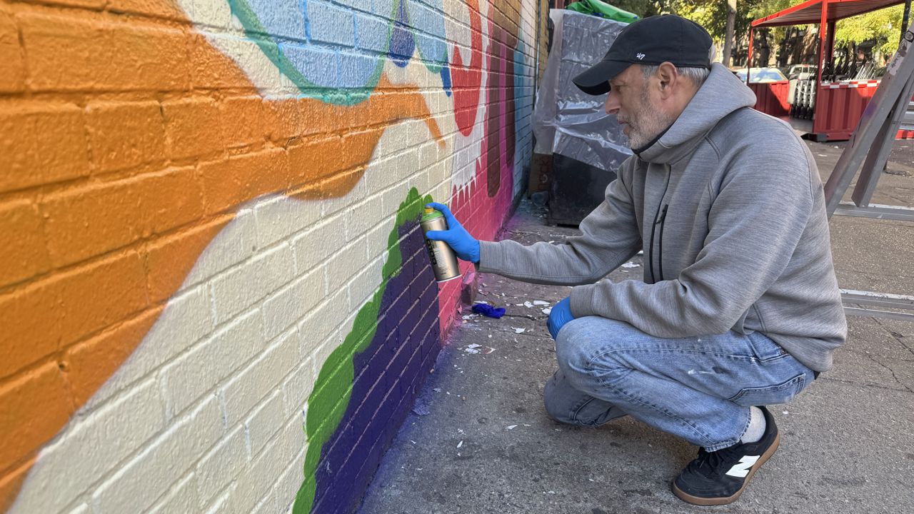 Legendary graffiti artist's mural celebrates arts org