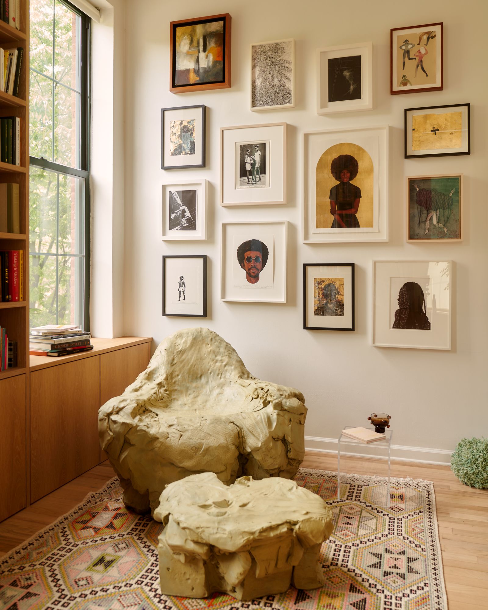 Image may contain Bo Diddley Corner Home Decor Person Floor Flooring Art Painting Furniture Rug and Indoors
