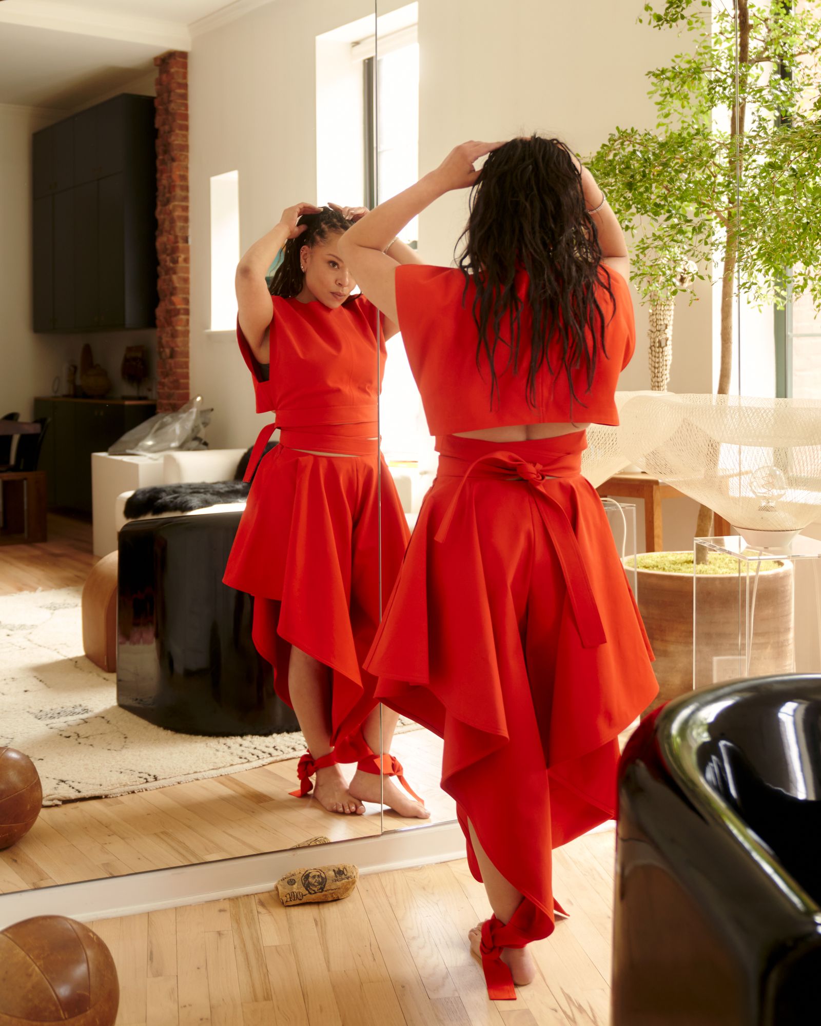 Image may contain Clothing Dress Evening Dress Formal Wear Adult Person Dancing and Leisure Activities