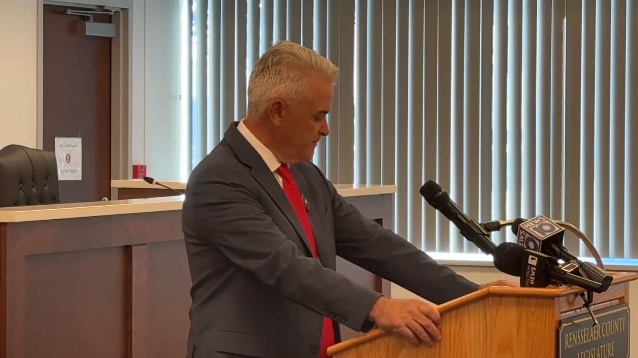 man at podium