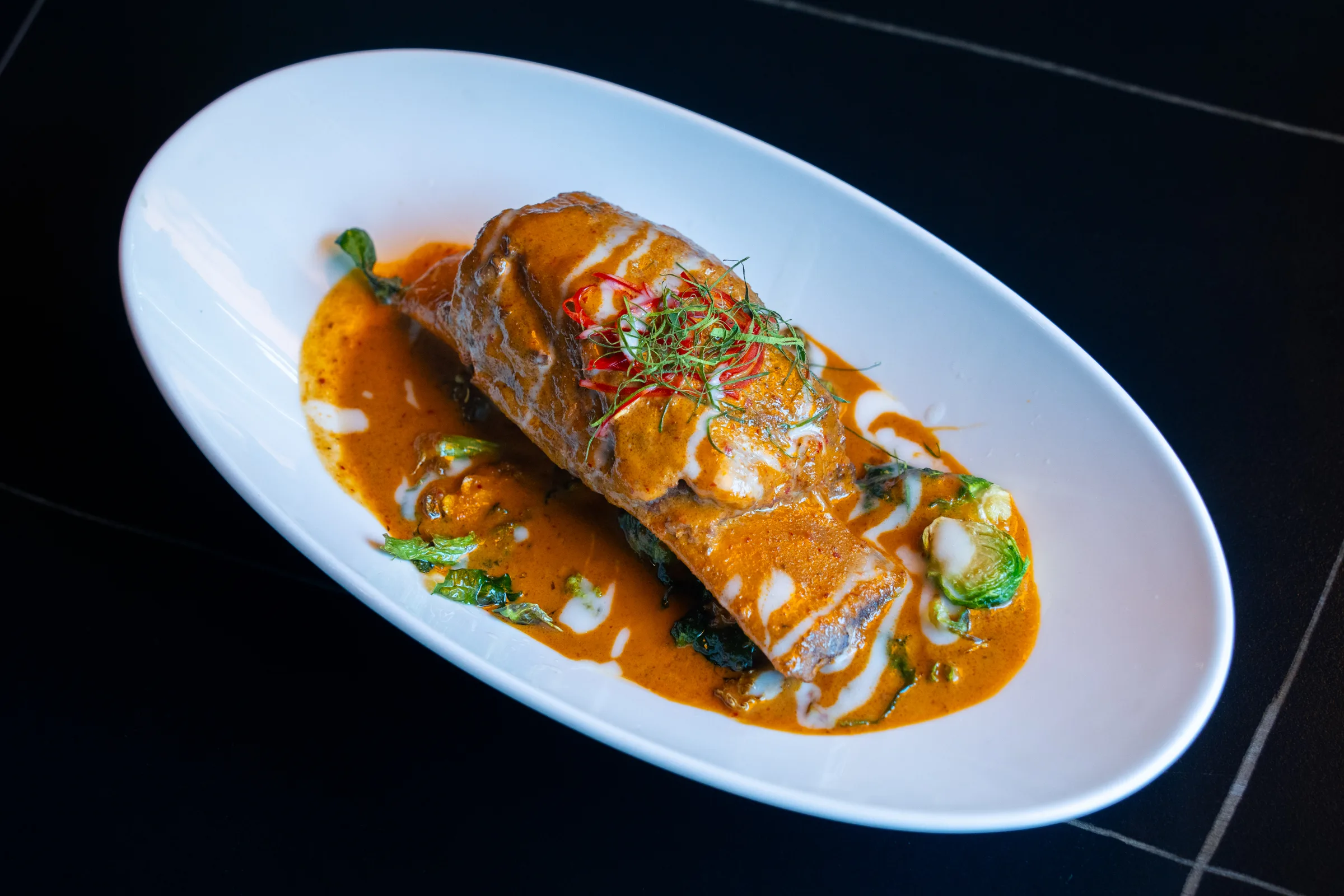 short rib curry from Chada on white plate