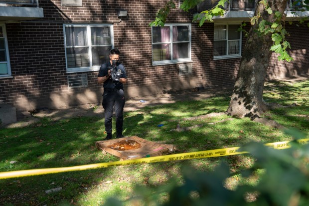 Police investigate after a 23-year-old woman was killed and a baby girl was critically hurt in a plunge from a an apartment building on Olinville Ave. in the Bronx early Tuesday, Oct. 6, 2026.