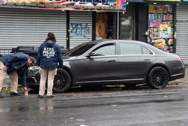 Bullet holes are seen in a Mercedes after a shooting on Rutland Rd. near E. 93rd St. in Brooklyn on Monday.