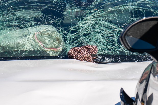 Police investigate after a white Mercedes struck three pedestrians, killing two, on Allerton Ave. in the Bronx on Friday, Oct. 9, 2026. (Theodore Parisienne / New York Daily News)